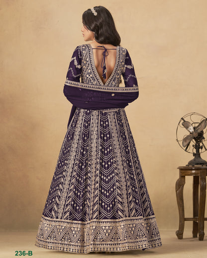 Woman wearing a patterned dress with a beige background