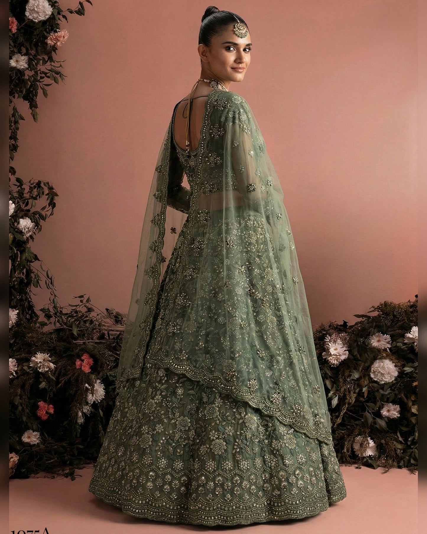 Woman in a green embroidered traditional outfit with a floral background