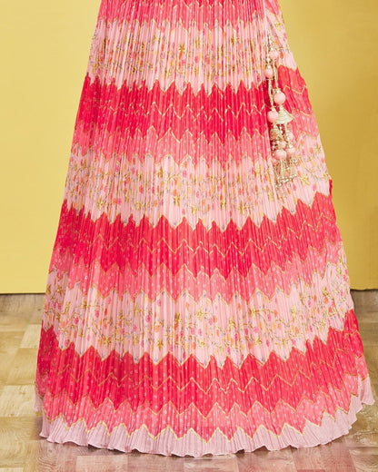 Pink and white pleated skirt with decorative elements on a yellow background