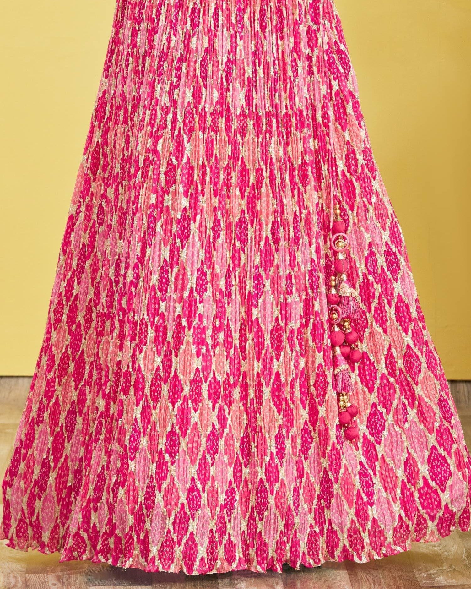 Pink patterned dress with buttons on a yellow background