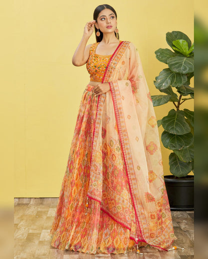 Woman wearing a colorful traditional outfit with a yellow background