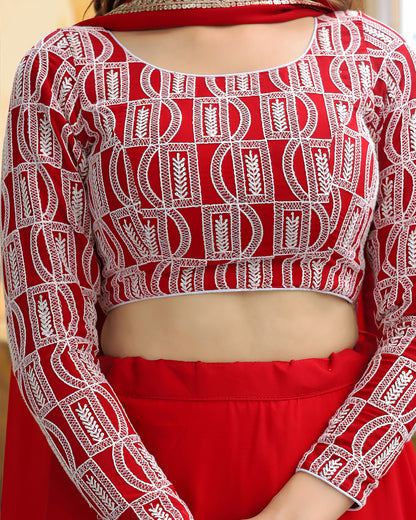 Red and white patterned blouse with a matching skirt