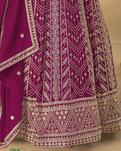 Purple traditional outfit with intricate white embroidery on a beige background