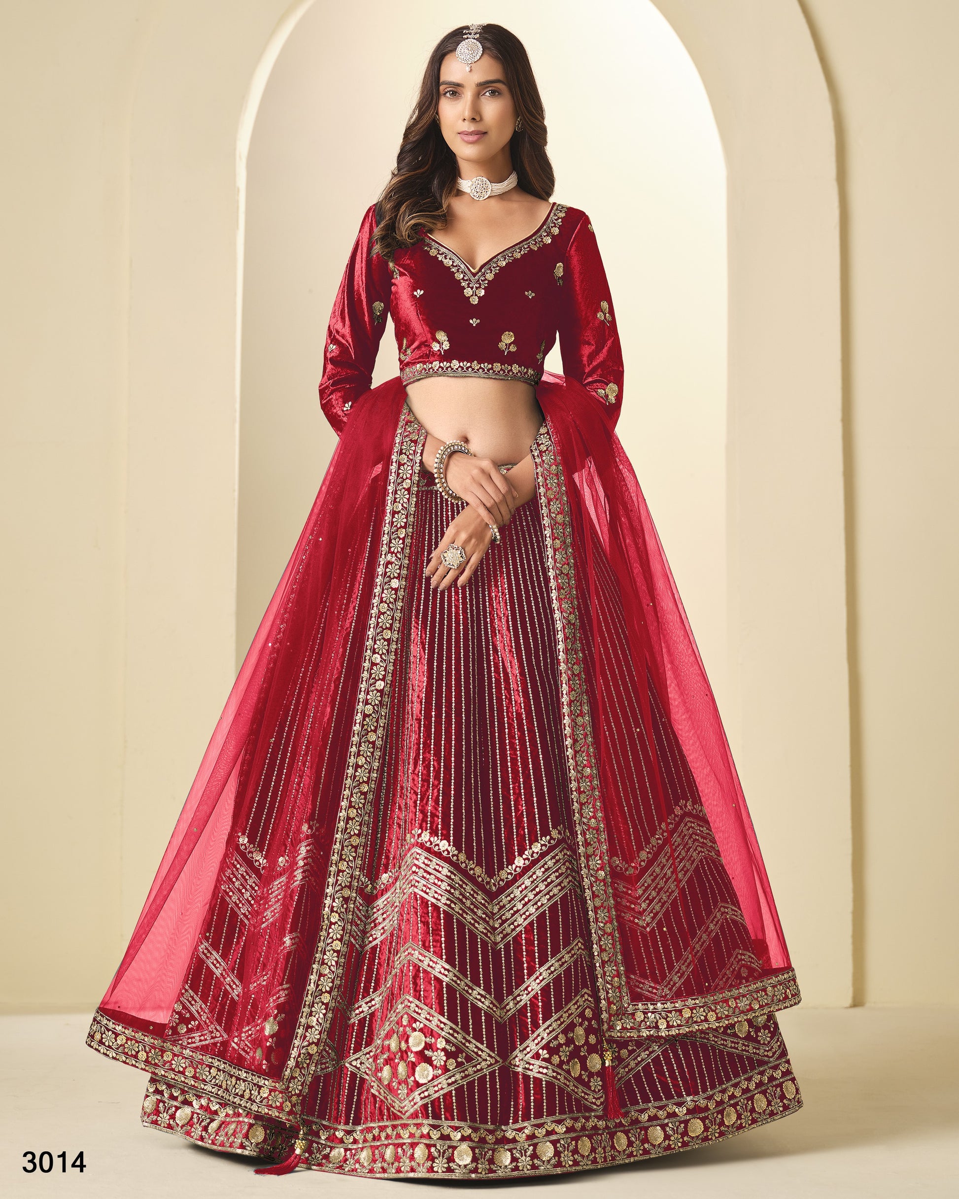 Red embroidered traditional outfit with a beige background