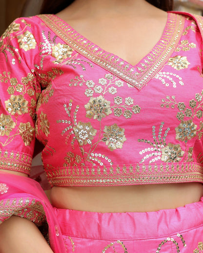 Pink embroidered blouse with gold details