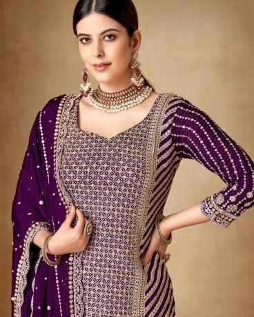 Woman wearing a traditional outfit with purple and gold details on a beige background