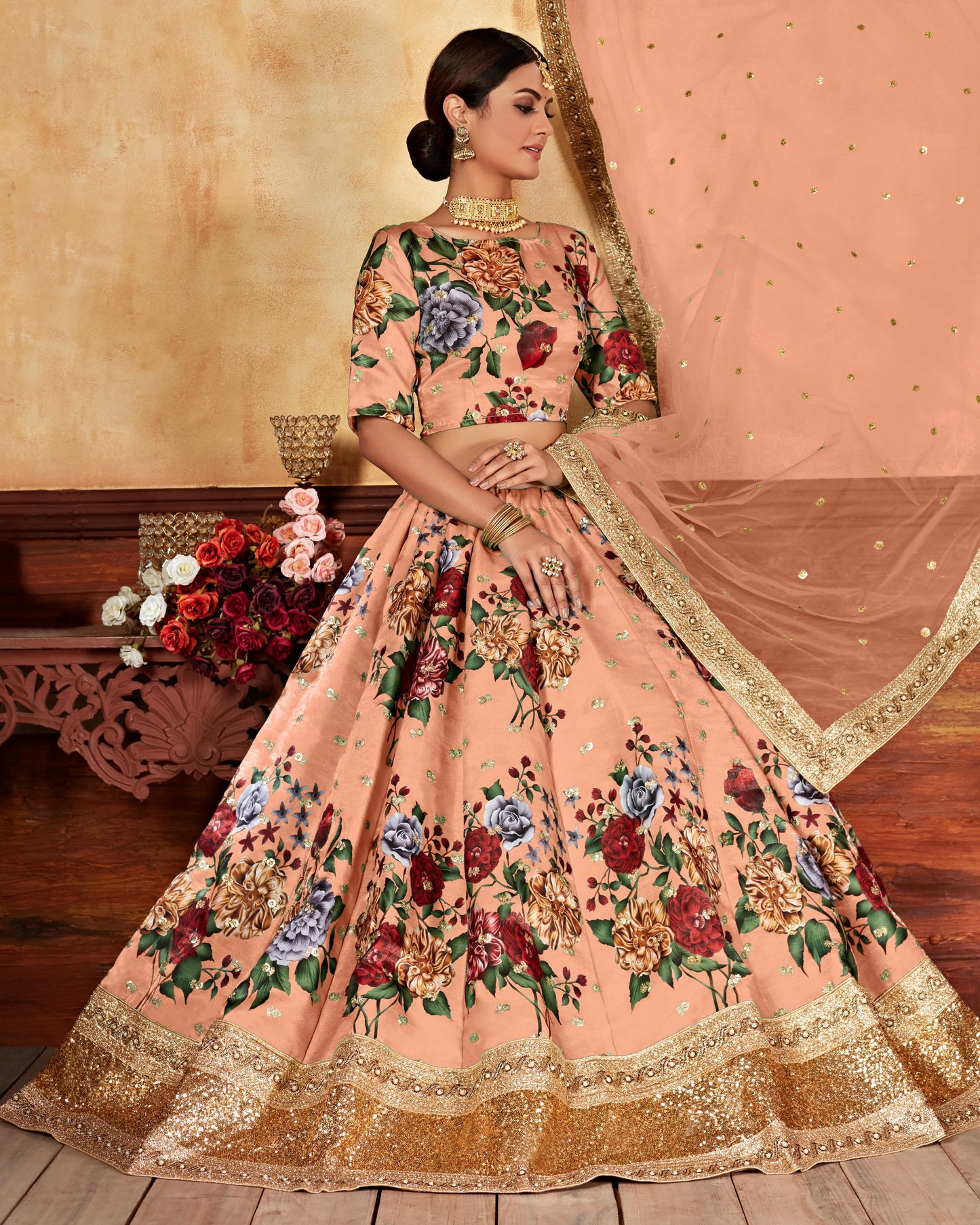 Woman wearing a peach floral traditional outfit with a beige background