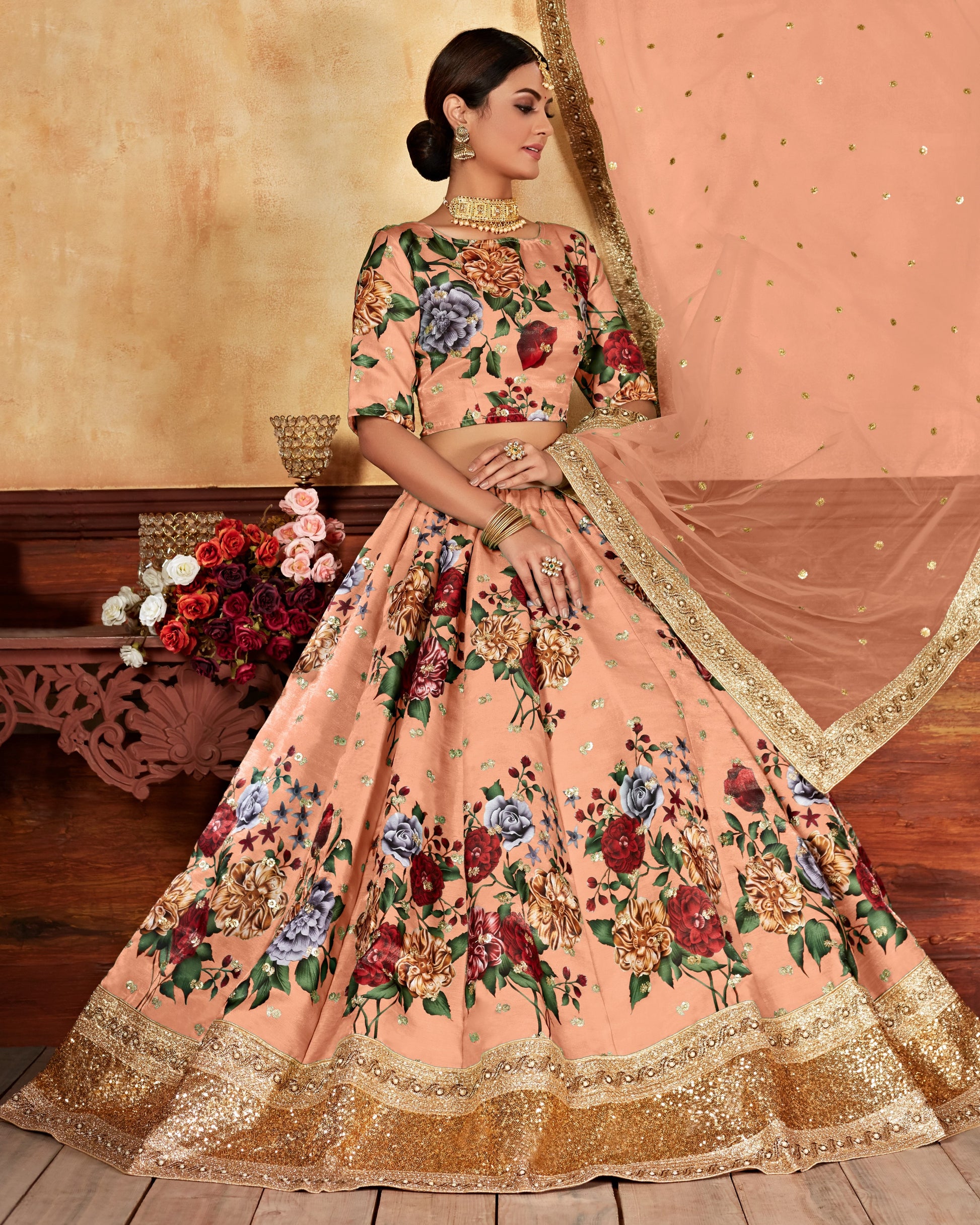 Woman wearing a peach floral traditional outfit with a beige background