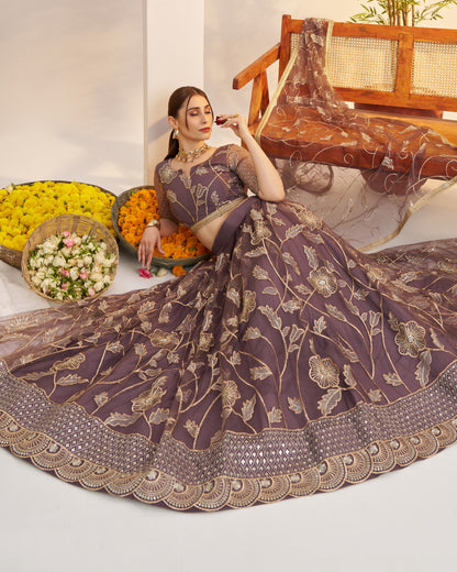 Woman in a purple embroidered traditional outfit with a wooden bench and flowers in the background