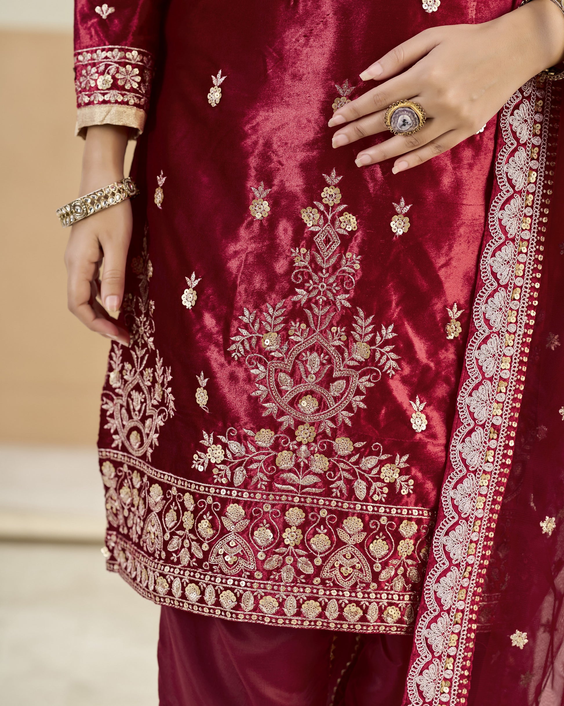 Maroon embroidered traditional outfit with gold detailing