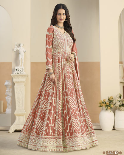 Woman wearing a patterned dress in an elegant indoor setting