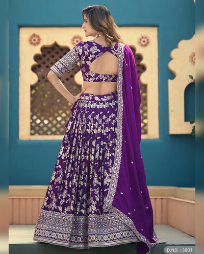 Woman wearing a purple and white traditional outfit with a blue background