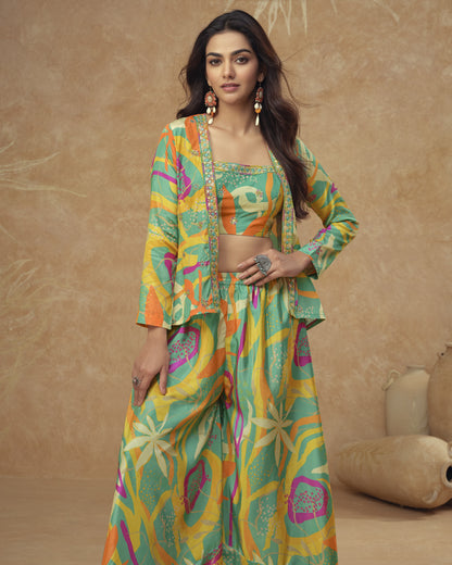 Woman wearing a colorful traditional outfit with a patterned jacket and pants against a beige background.