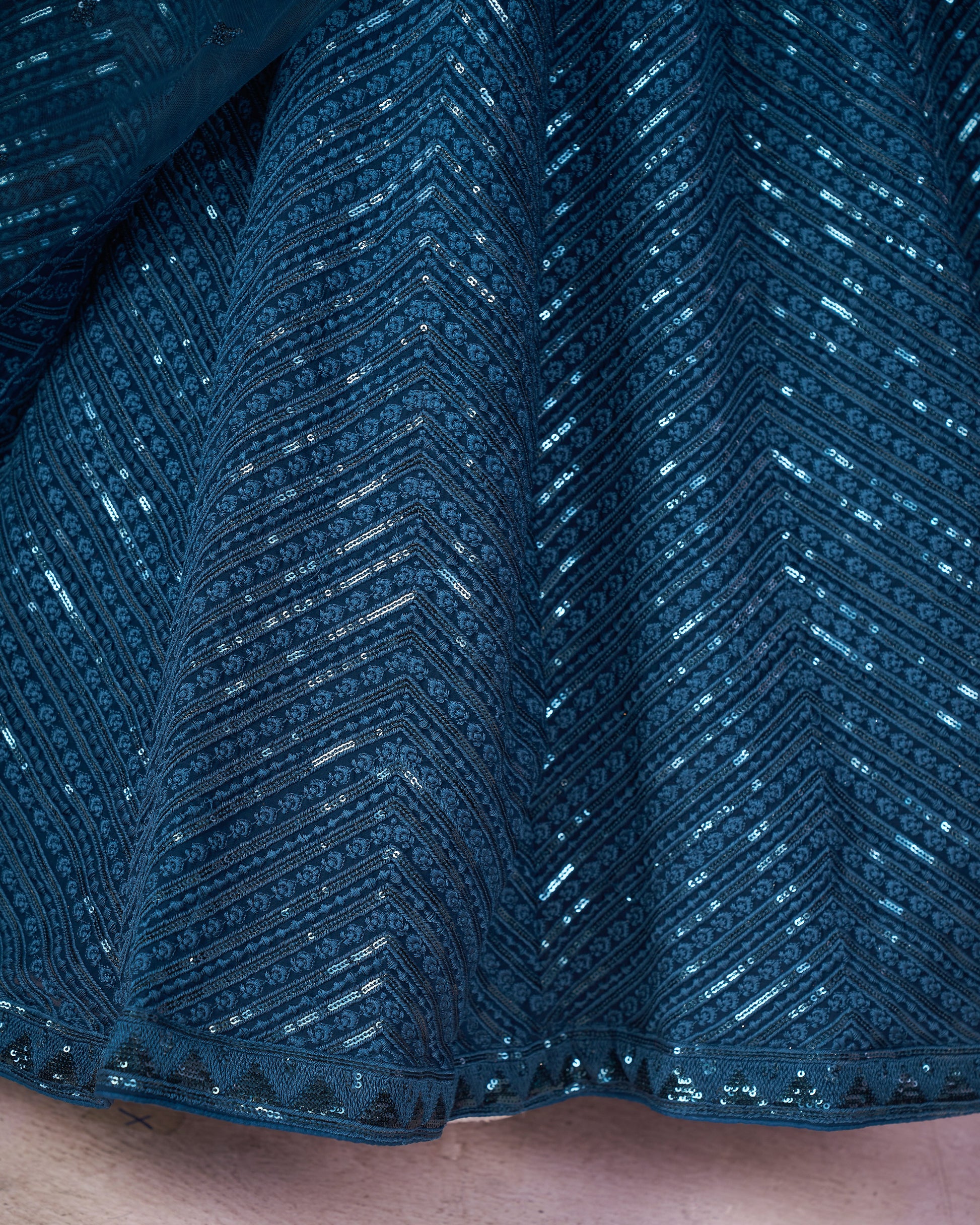 Close-up of blue textured fabric with a pattern