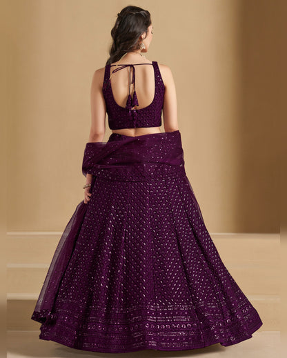 Woman wearing a purple traditional outfit with a beige background