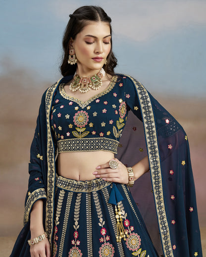 Woman wearing a traditional embroidered outfit with a blurred natural background