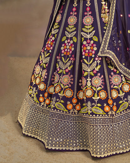 Close-up of a purple embroidered garment with floral patterns on a beige background