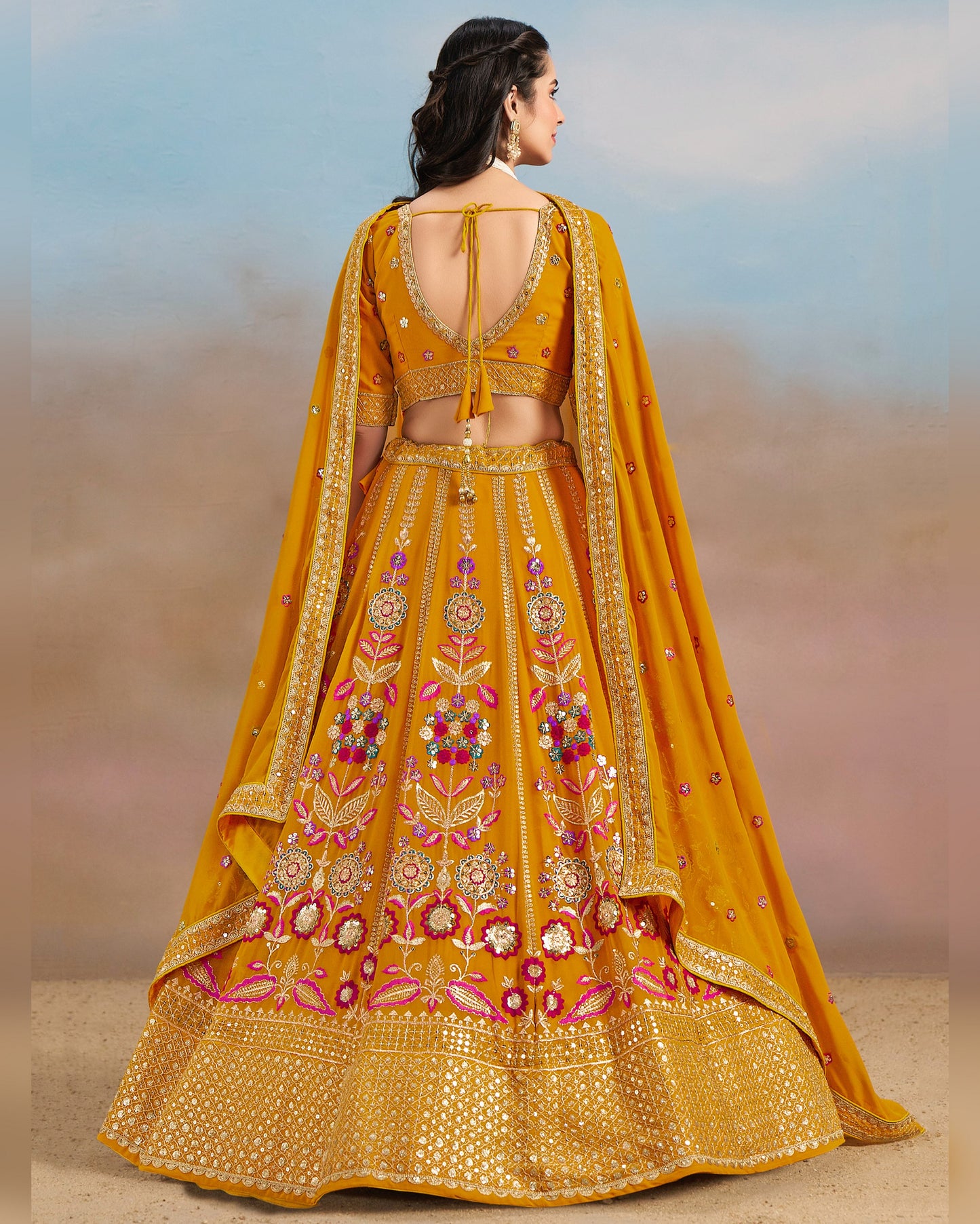 Yellow embroidered traditional outfit with a blurred background