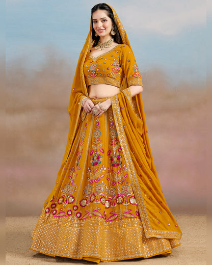 Woman wearing a yellow embroidered traditional outfit with a blurred background