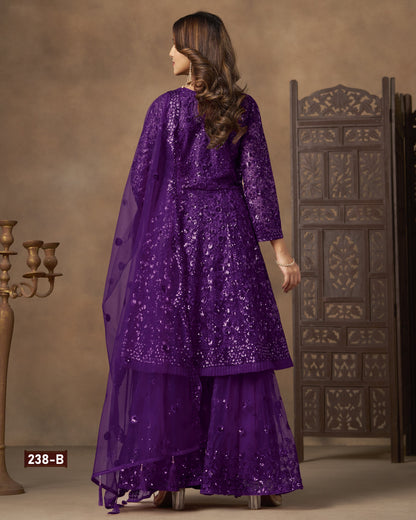 Woman wearing a purple traditional outfit with a textured wall and decorative door in the background