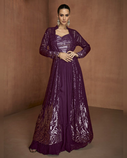 Woman wearing a purple sequin dress against a brown background