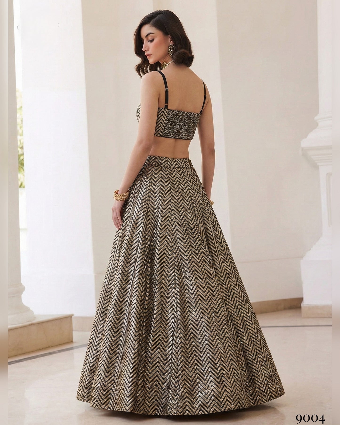 Woman wearing a patterned outfit in an indoor setting