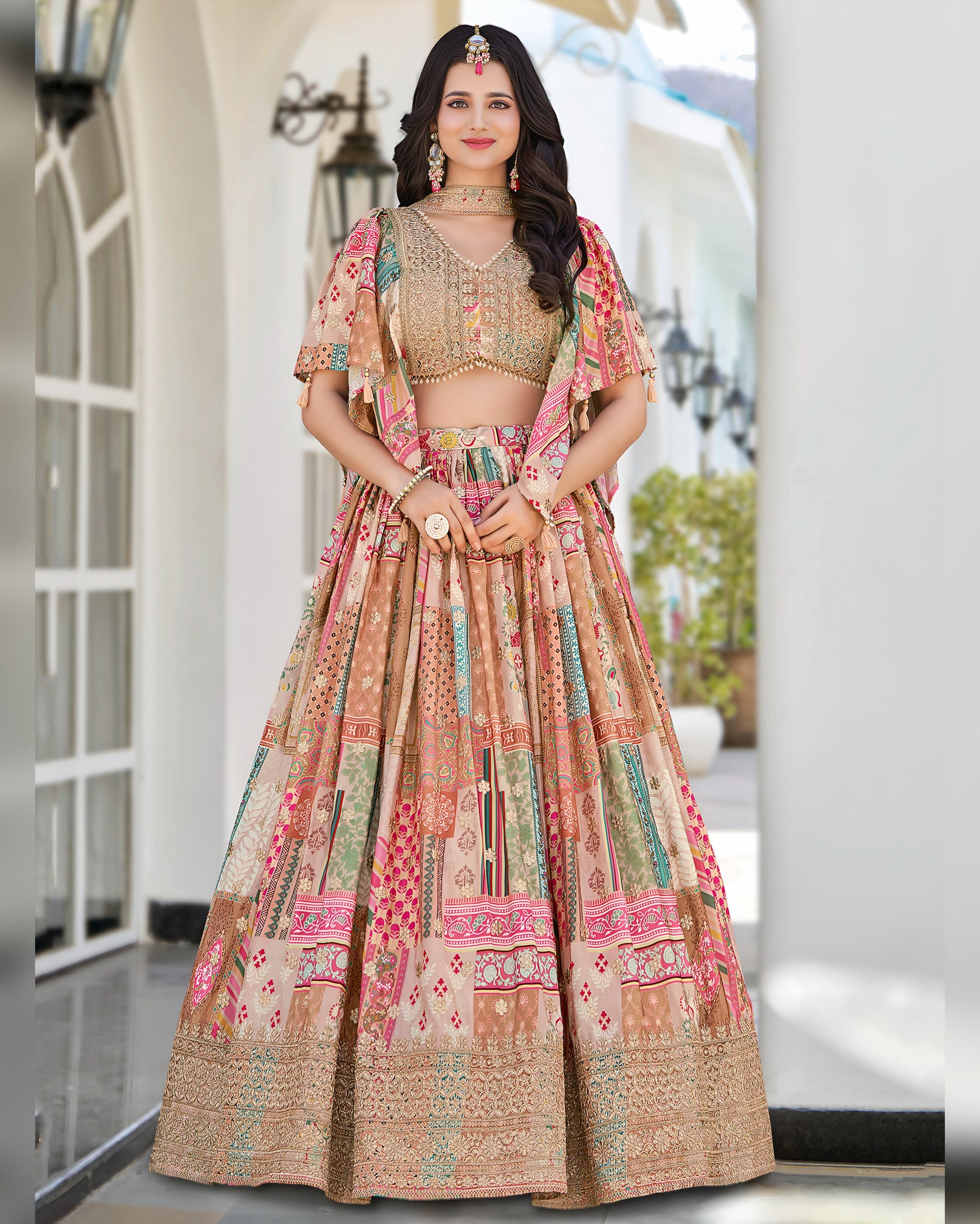 Woman wearing a traditional multicolored lehenga with a matching blouse in an outdoor setting.