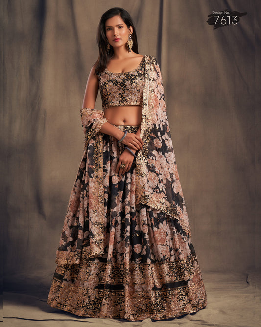 Woman wearing a floral lehenga with a plain background