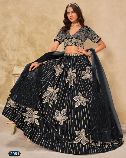 Woman wearing a black and white embroidered traditional outfit with a beige background