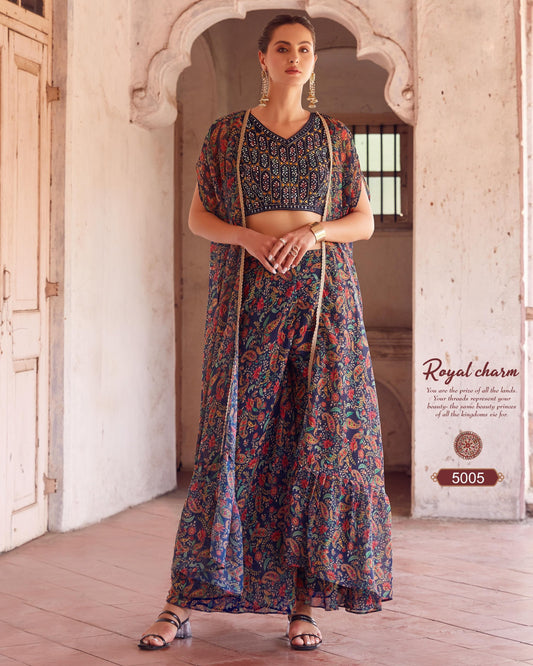 Woman wearing a floral dress with a long jacket in an archway setting