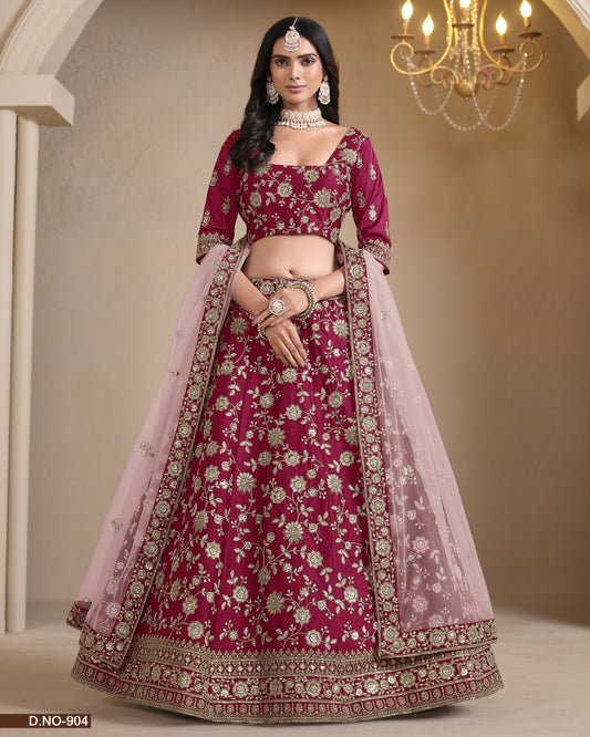 Traditional pink embroidered lehenga with a chandelier in the background