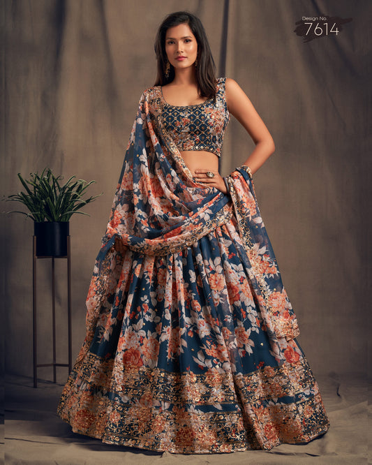 Woman wearing a floral lehenga with a plain background