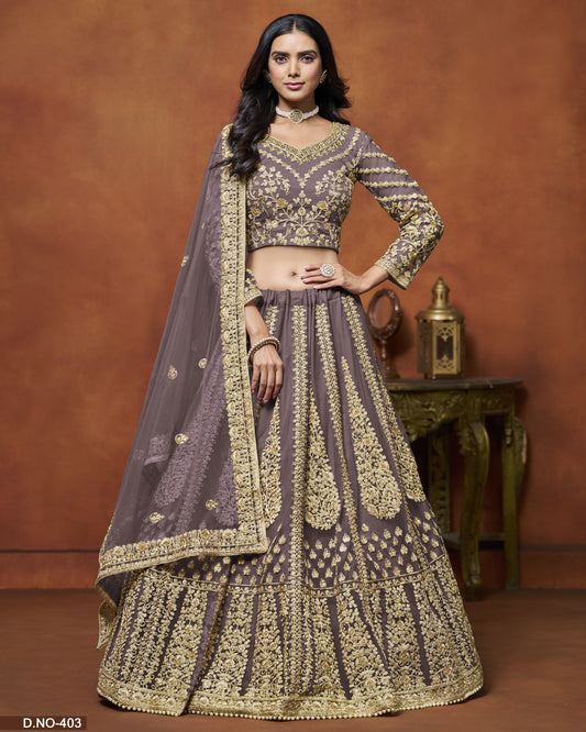 Woman wearing a traditional outfit with intricate designs on a brown background