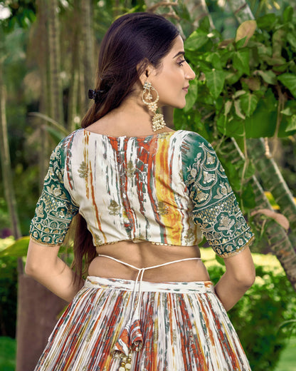 Woman wearing a patterned outfit with a blurred natural background