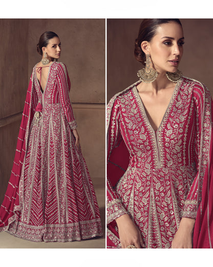 Woman wearing a red and white patterned traditional outfit with a matching dupatta.