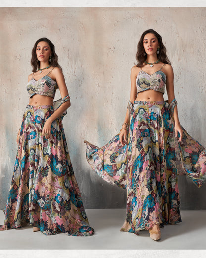 Woman wearing a floral two-piece outfit with a neutral background