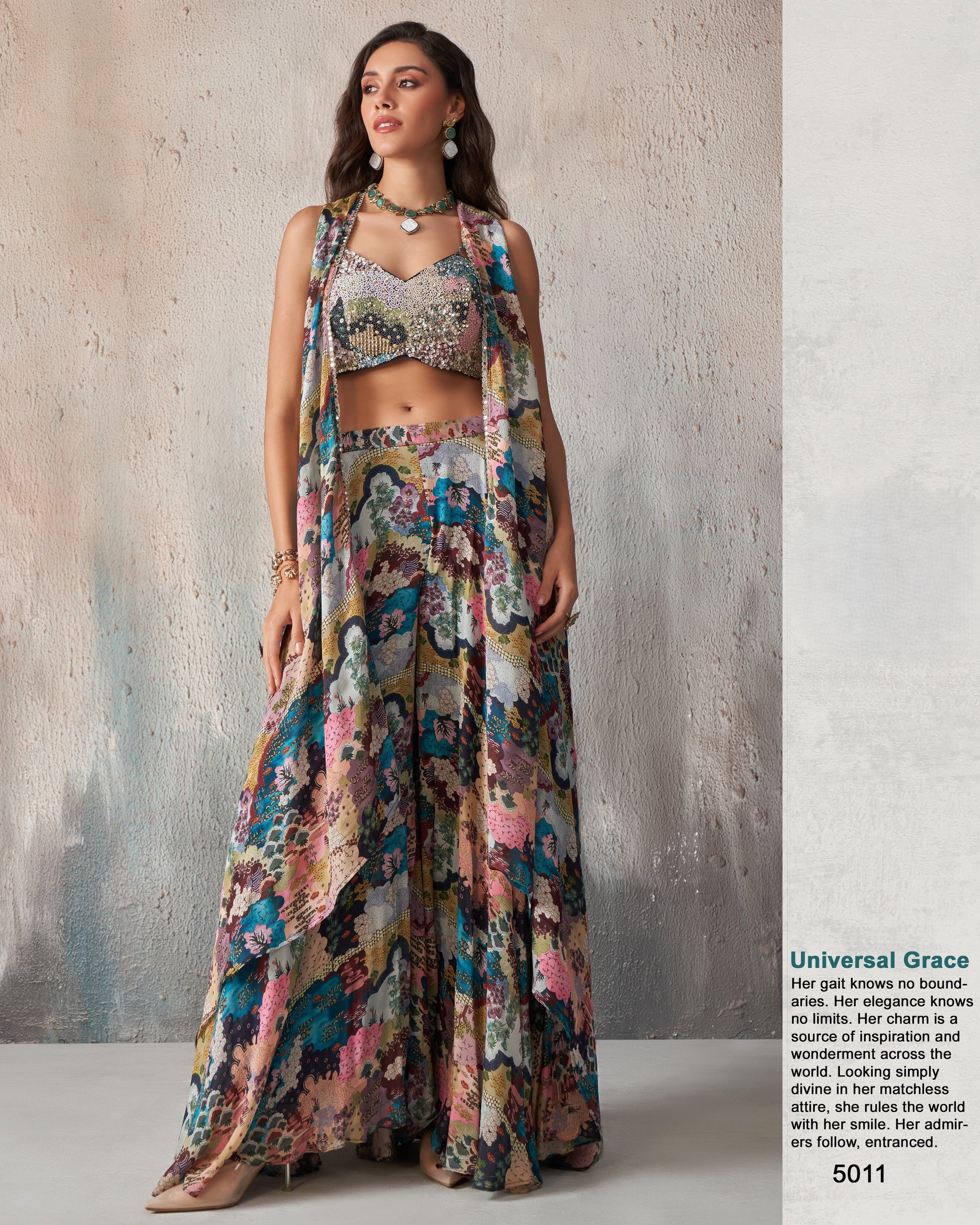 Woman wearing a colorful patterned outfit against a neutral background