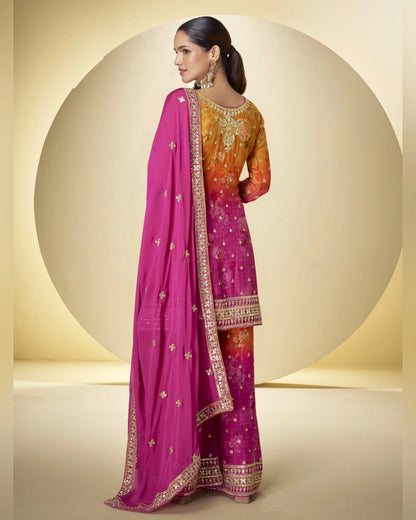 Woman wearing a traditional outfit with a pink and orange saree on a beige background