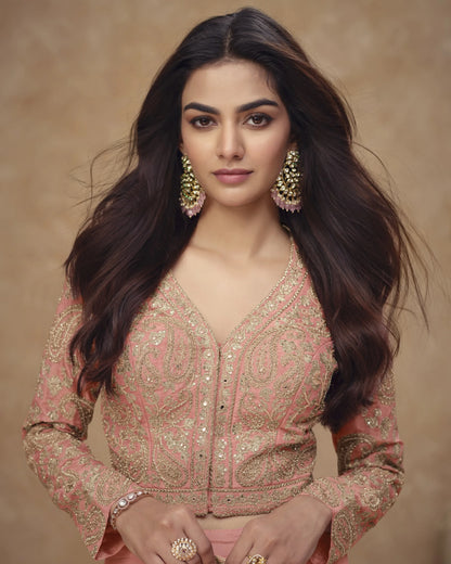 Woman wearing a traditional outfit with intricate designs on a beige background