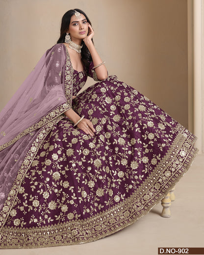 Woman in a purple embroidered traditional outfit with gold details on a beige background