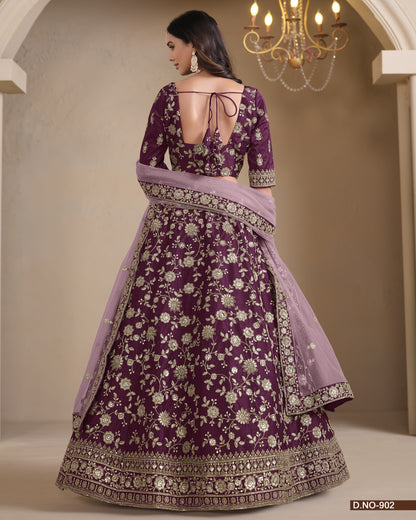Purple embroidered traditional outfit with a matching dupatta on a neutral background