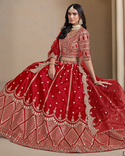 Woman wearing a red embroidered traditional outfit with gold details on a neutral background