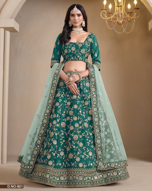 Woman wearing a green embroidered lehenga with a chandelier in the background