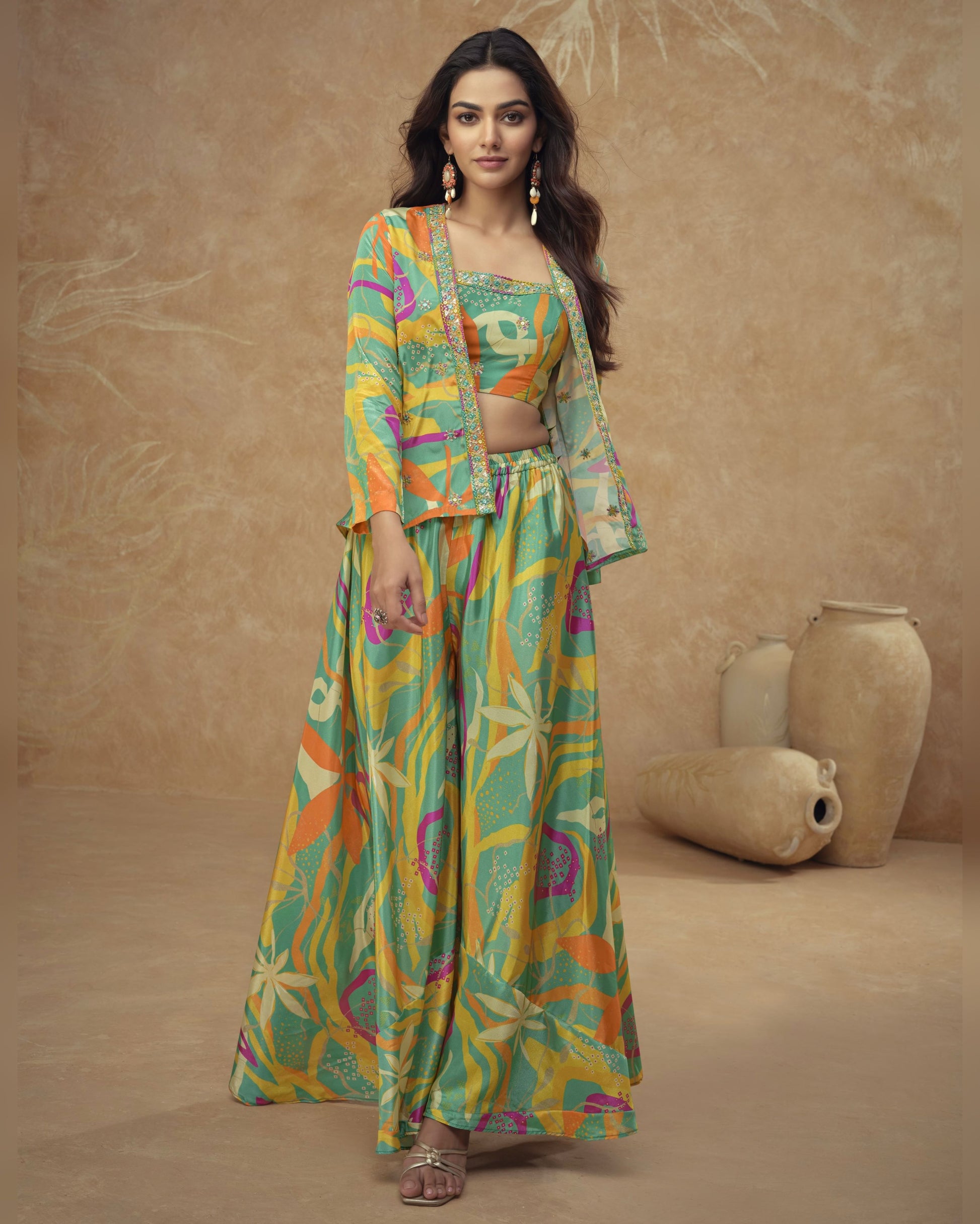 Woman wearing a colorful traditional outfit with a patterned design against a beige background.